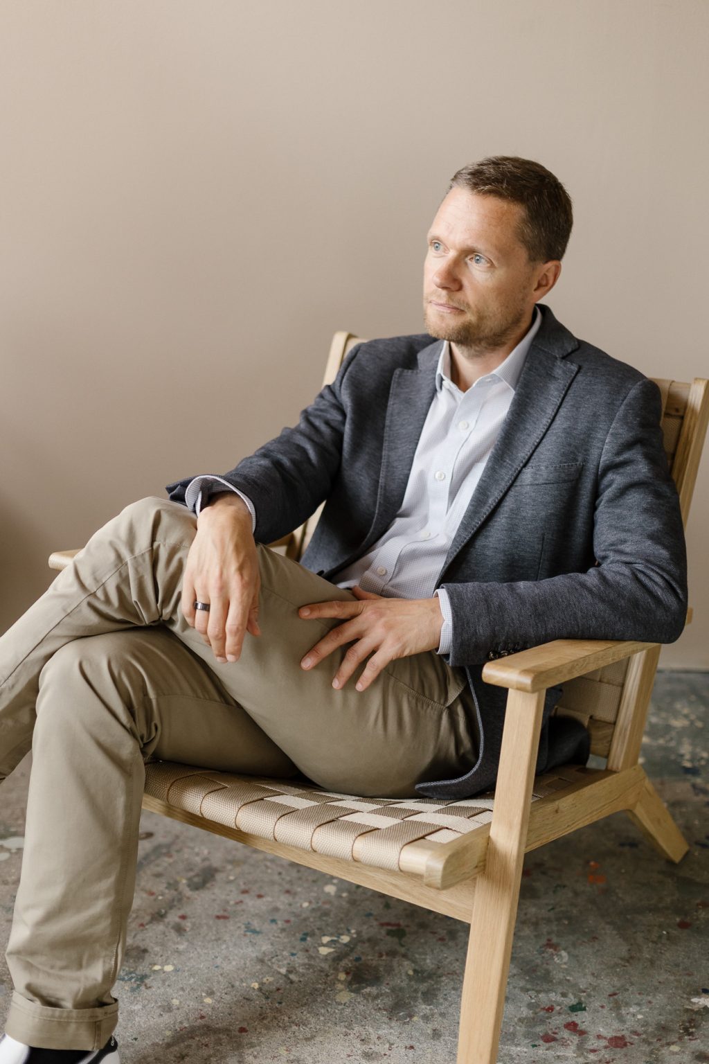 Picture of Artome's account manager Janne Orava sitting on the chair.